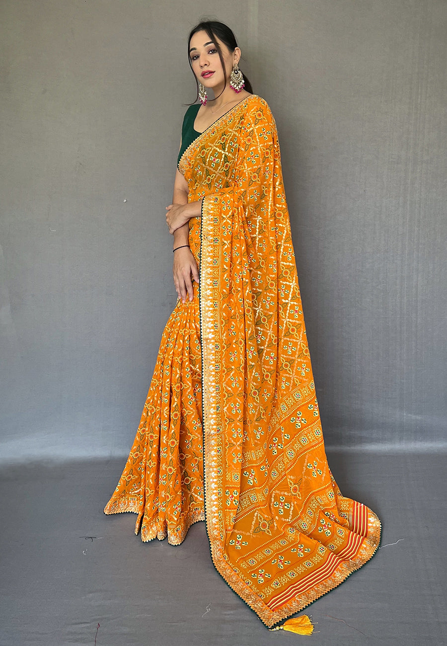 Turmeric Orange Georgette Bandhani Gota Patti Embroidered Saree