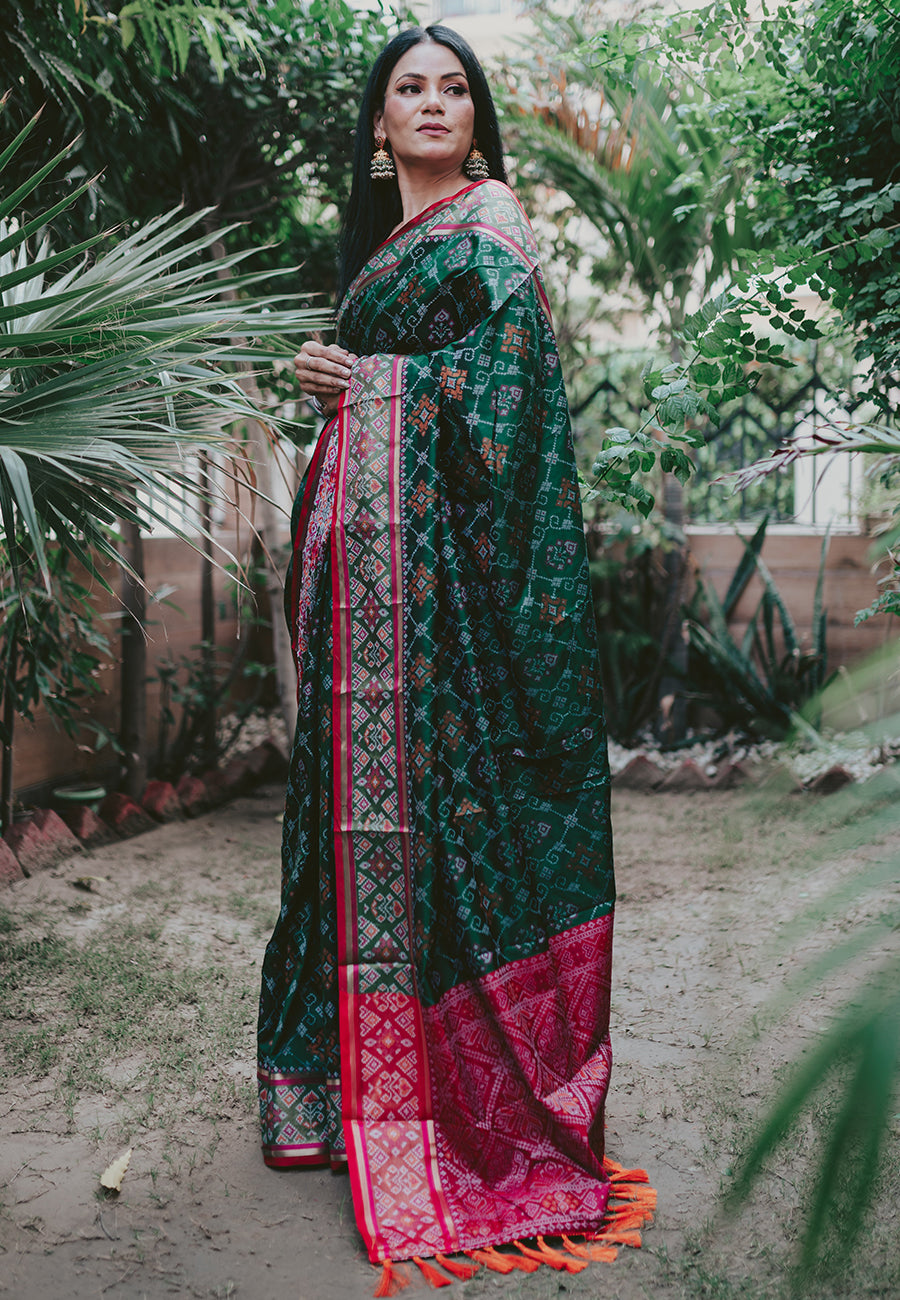 Anu Mishra in Jungle Green Rangeen Patola Contrast Woven Silk Saree